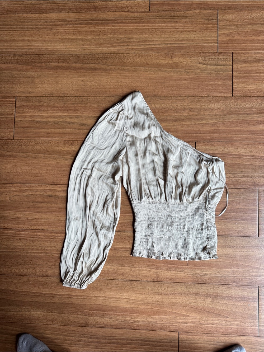 Crème satin one shoulder blouse